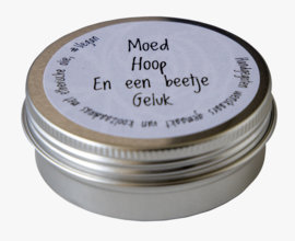 Kaars, moed hoop en een beetje geluk