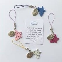 Vlinder met tree of life bedel