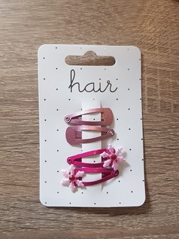 2 sets rozekleurige haarspelden