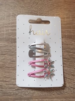 Set rozekleurige en zilverkleurige haarspelden