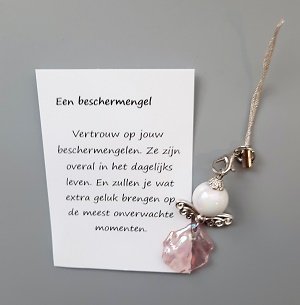 Beschermengel met schelpenrokje