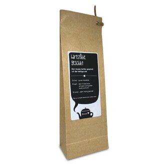losse-voel-de-warmte-thee-in-een-zakje-met-houten-theepot