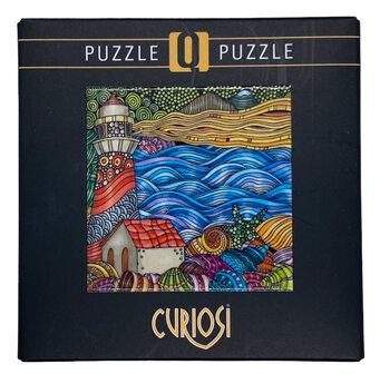 Artistieke vuurtoren puzzel 72 stukjes in vierkant doosje.