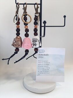 Assortiment van Boeddha sleutelhangers in verschillende kleuren