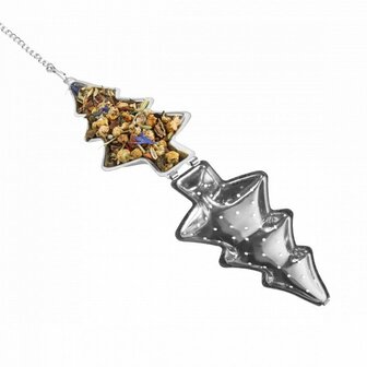 Open thee-ei met losse kerstthee en kerstboom thee-ei naast cadeauverpakking