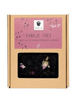 Dank je thee in geschenkverpakking met zwarte thee en bessen als bedankje