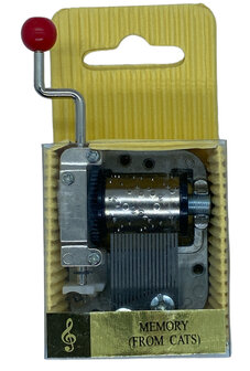 Close-up van het binnenwerk en mechanisme van het Cats muziekdoosje