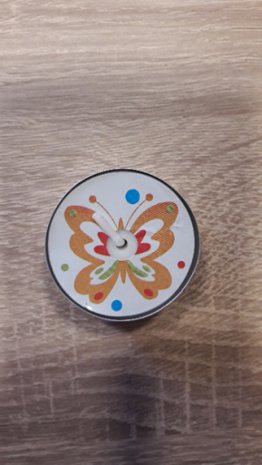 Waxinelichtjes, vlinder oranje