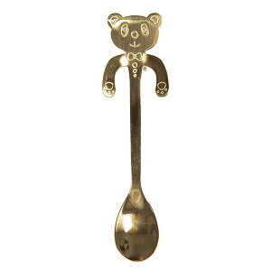 Decoratief thee- en koffielepeltje in de vorm van een goud beer van metaal.
