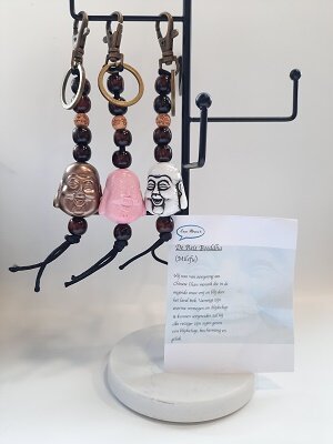 Assortiment van Boeddha sleutelhangers in verschillende kleuren