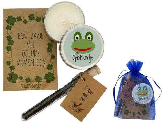 Zakje vol geluksmomentjes met kaars, zaadjes en kaartje