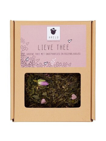 Lieve Thee met suikerhartjes en rozenblaadjes in geschenkverpakking