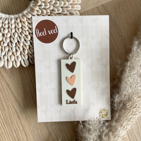 Betekenisvolle sleutelhanger met tekst Liefs op giftcard