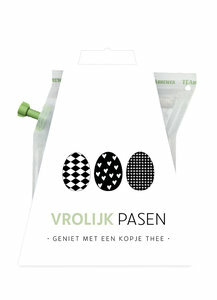 Innovatieve teabrewer gevuld met kruidenthee en de tekst vrolijk pasen