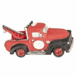 Rode magneet in de vorm van een takelwagen auto van polyresin.