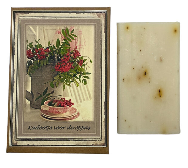 Detailopname van het ge&iuml;ntegreerde heerlijk geurende zeepje op het vintage kaartje
