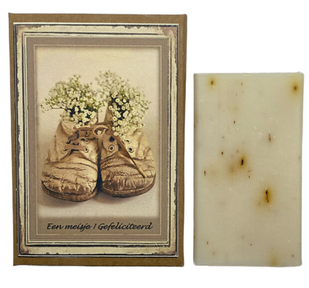 Detailopname van het ingebouwde geurede zeepje in het vintage kaartje voor een meisje