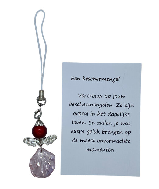 Beschermengeltje met roze rokje van schelp op een geschenkkaartje.