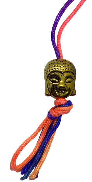 Kleine gouden Boeddha hoofdjes als spiritueel bedankje