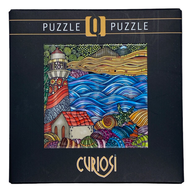 Artistieke vuurtoren puzzel 72 stukjes in vierkant doosje.