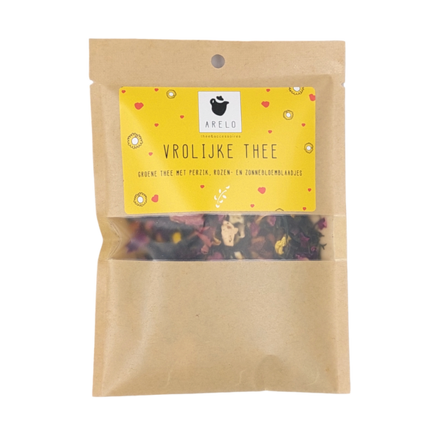 Luxe geschenkverpakking met de tekst Vrolijke thee en losse groene thee met perzik