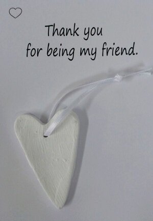 Witte kaart met tekst Thank you for being my friend en het stenen hartje