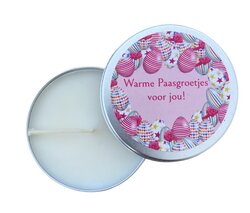 Handgegoten kaars koolzaadwas met warme paasgroetjes en eitjes