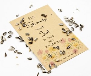 Een bloemetje voor jou! Je bent een zorgtopper (zonnebloemzaden) Een bloemetje voor jou! Je bent een zorgtopper (zonnebloemzaden)