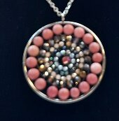 Mandala ketting met natuursteen Rhodochrosiet Mandala ketting met natuursteen Rhodochrosiet
